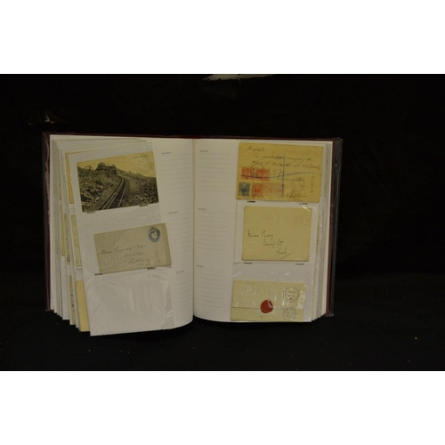 375 - Postal History - an interesting album of mainly Edwardian postcards and post marks on envelopes incl... 