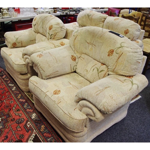 454 - A contemporary three piece suite comprising two seat settee and two armchairs.