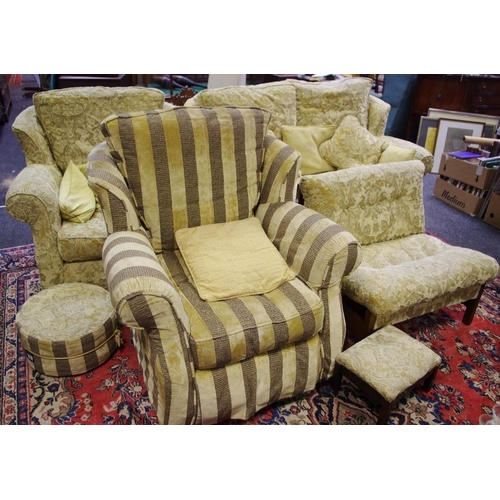 468 - A modern two seat sofa, conforming armchair, conforming re-upholstered armchair easy chair, footstoo... 