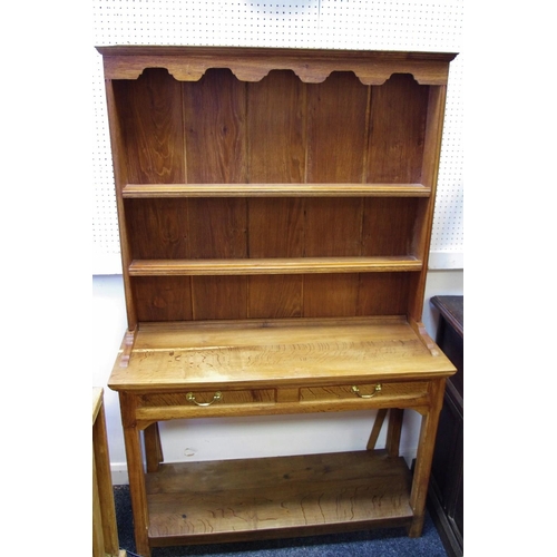 492 - A modern farmhouse oak dresser, faux drawers to frieze above open undertier