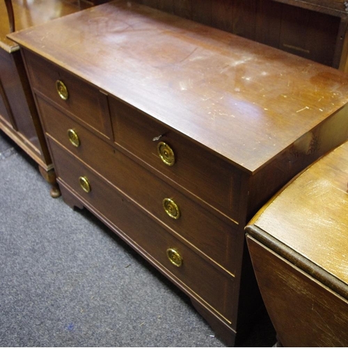 510 - An Edwardian mahogany chest of two short over two long drawers, brass rounded escutcheons, loop hand... 