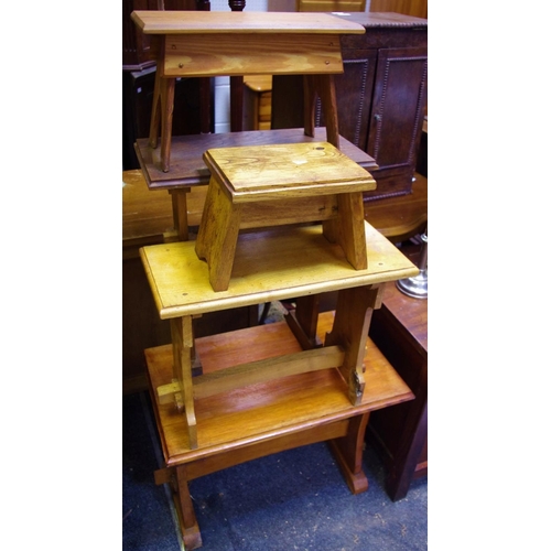 515 - An ecclesiastical oak hymn stool;various smaller stools