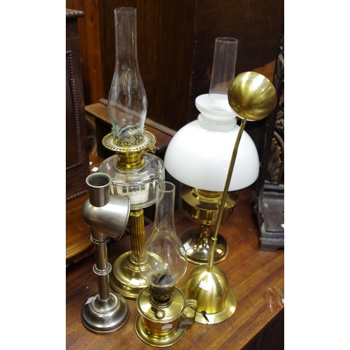 516 - Lighting - The Cambridge No.2 reading lamp; an early 20th century brass oil lantern; another later; ... 