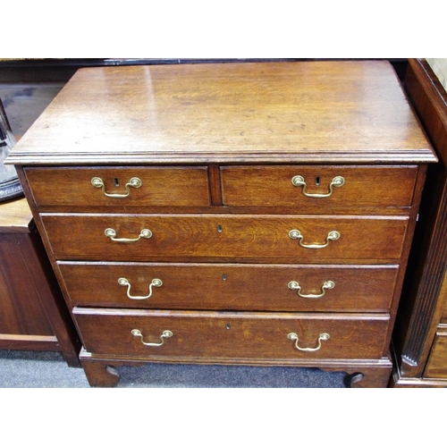 520 - A George III oak chest, moulded top, two short drawers over three graduated long, brass swan neck sw... 