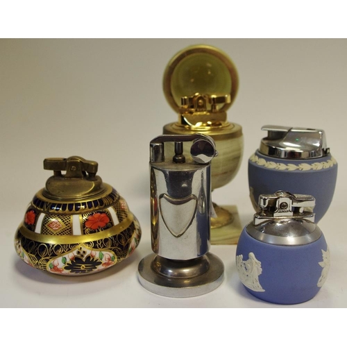 67 - A Royal Crown Derby 1128 Imari table lighter; a Wedgwood Jasperware table lighter; another similar; ... 