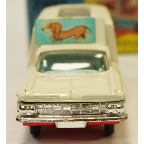 109 - Corgi 486 Chevrolet Impala ''Kennel Club'' - two-tone, white, red, pale blue interior with 4 dog fig... 