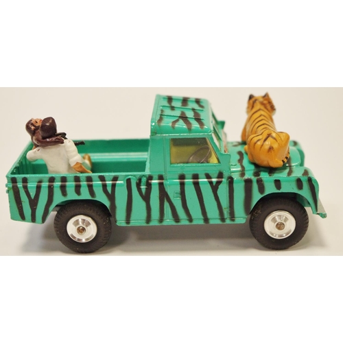 112 - Corgi GS7 ''Daktari'' Gift Set comprising of Land Rover (109wb) - green with black stripes, lemon in... 