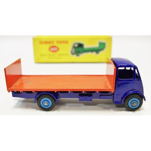 114 - Dinky 433 Guy Flat Truck with Tailboard - blue cab, chassis, orange back, mid-blue Supertoy hubs wit... 