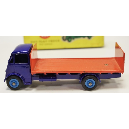 114 - Dinky 433 Guy Flat Truck with Tailboard - blue cab, chassis, orange back, mid-blue Supertoy hubs wit... 