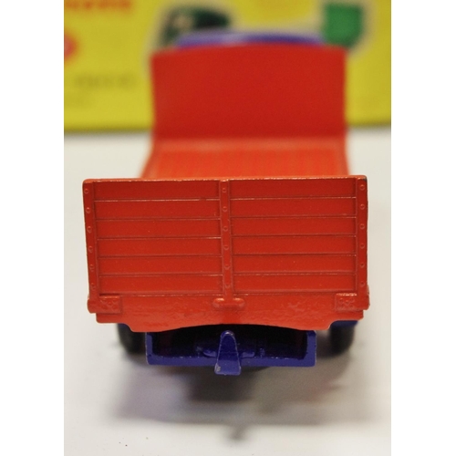 114 - Dinky 433 Guy Flat Truck with Tailboard - blue cab, chassis, orange back, mid-blue Supertoy hubs wit... 