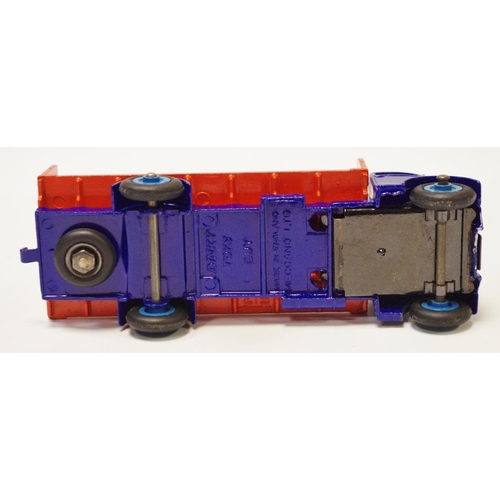 114 - Dinky 433 Guy Flat Truck with Tailboard - blue cab, chassis, orange back, mid-blue Supertoy hubs wit... 