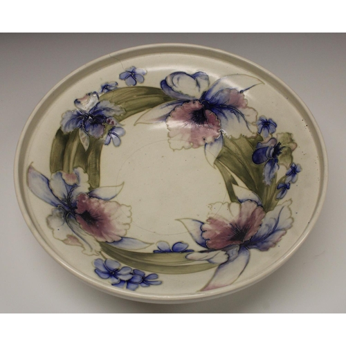 503 - A Moorcroft Orchid pattern pedestal bowl, tube lined with large flowerheads on white ground, 31cm di... 