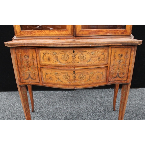 103 - A Sheraton Revival satinwood and marquetry serpentine display cabinet, break-arch pediment above a p... 