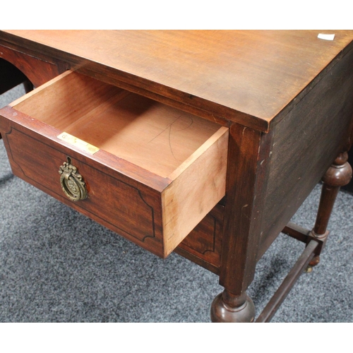 104 - An early 20th century mahogany dressing table, arched superstructure with adjustable mirror above tw... 