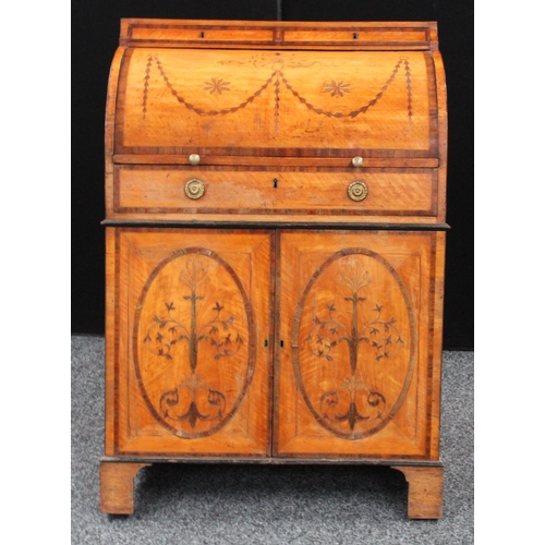 107 - A Neo-Classical mahogany crossbanded satinwood cylinder bureau, concave frieze with a pair of drawer... 