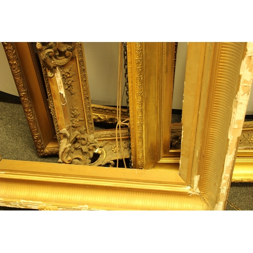 3 - A large gilt and gesso frame, 124cm x 94cm, internal 91cm x 61cm;   others, 10cm x 91cm, inner 78cm ... 