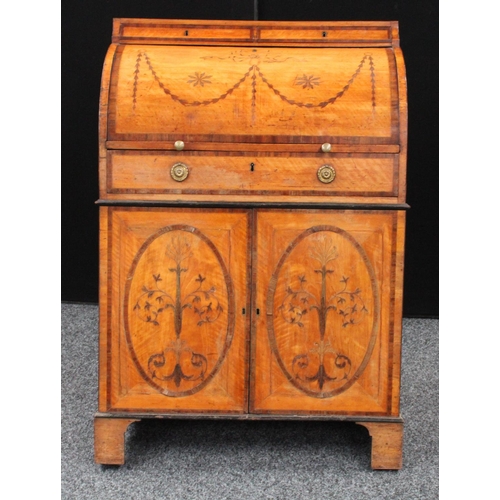 107 - A Neo-Classical mahogany crossbanded satinwood cylinder bureau, concave frieze with a pair of drawer... 