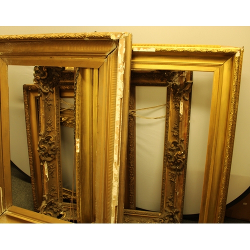 3 - A large gilt and gesso frame, 124cm x 94cm, internal 91cm x 61cm;   others, 10cm x 91cm, inner 78cm ... 