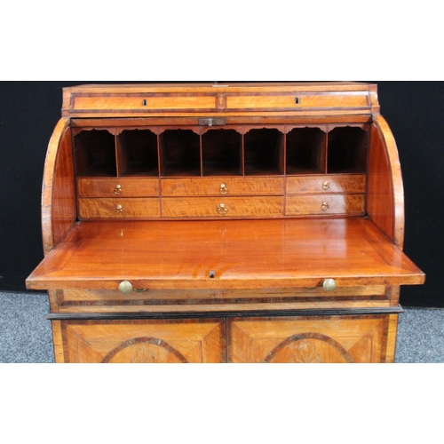 107 - A Neo-Classical mahogany crossbanded satinwood cylinder bureau, concave frieze with a pair of drawer... 