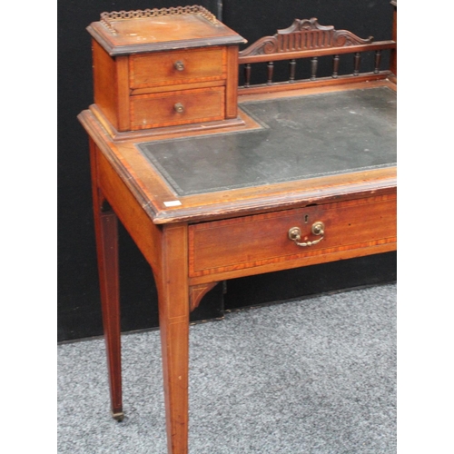 109 - An Edwardian mahogany writing table/desk, rectangular top with inset writing surface and two banks o... 