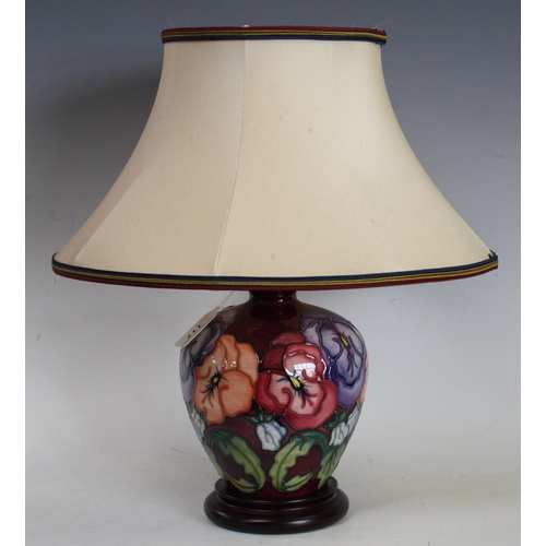 117 - A Moorcroft Pansy pattern table lamp, 27cm high overall