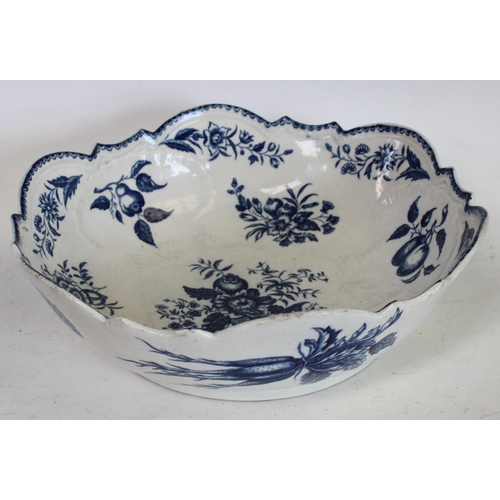 120 - A Worcester Pomegranate pattern shell moulded junket bowl, printed in blue with pine cones, peonies ... 