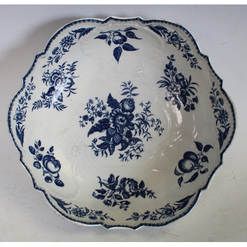 120 - A Worcester Pomegranate pattern shell moulded junket bowl, printed in blue with pine cones, peonies ... 