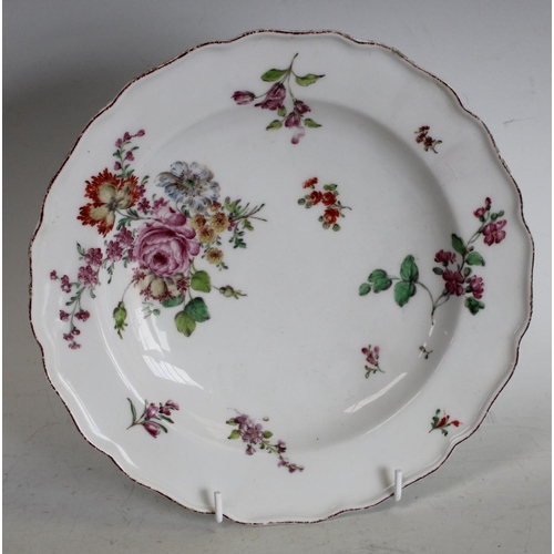 122 - A Chelsea shaped plate, painted in Meissen style with a large bouquet and scattered flower sprays, i... 