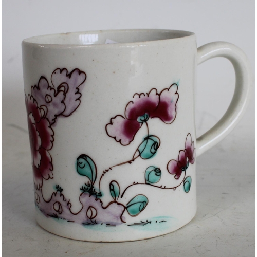 124 - A Bow coffee can,  painted in Famille Rose palette with peony and with trailing flowers and holed ro... 