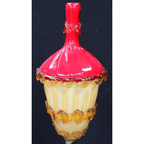 143 - A large glass Murano glass table lamp as a man under a lampost