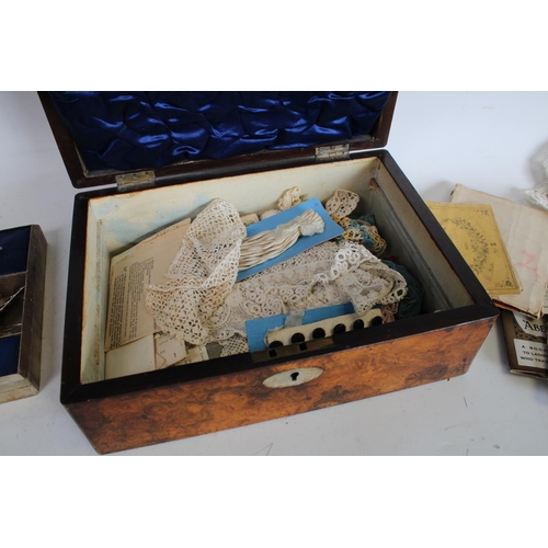 145 - A Victorian walnut rectangular work box, fitted interior enclosing a collection of conforming appurt... 