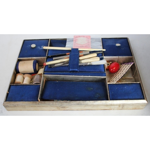 145 - A Victorian walnut rectangular work box, fitted interior enclosing a collection of conforming appurt... 