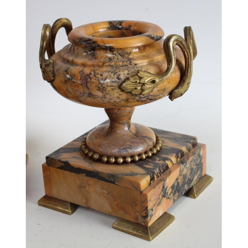 148 - A 19th century Neoclassical Revival gilt-metal mounted Sienna Marble mantel clock garniture, the dru... 