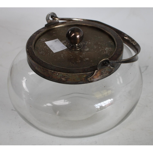 150 - Metalware - a brass five branch altar candelabrum; EPNS spirit kettle; an Edwardian squat biscuit ja... 