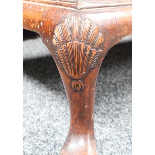 153 - A Queen Anne style walnut wardrobe, 'double-dome' cornice above a pair of doors enclosing a hanging ... 