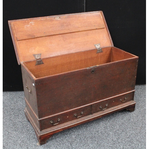 156 - A George III oak mule chest, hinged rectangular top enclosing a vacant interior, above a pair of sho... 