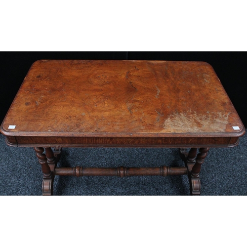 157 - A Victorian oak centre table, rounded rectangular top above a shallow frieze drawer, spirally turned... 
