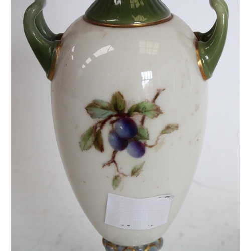 169 - A Royal Worcester slender ovoid two handled vase, painted with fruiting branches, the fluted neck an... 