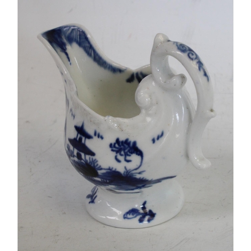 171 - A Derby low ewer, painted in underglaze blue with a two story hut on an island, moulded feathered ri... 