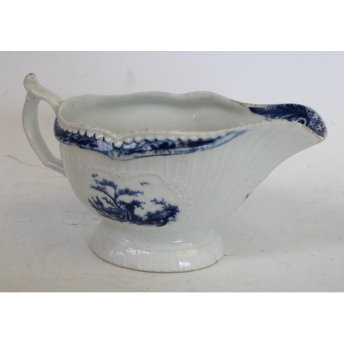 172 - A Worcester sauce boat, with slightly curved vertical moulding, painted with two slightly differing ... 