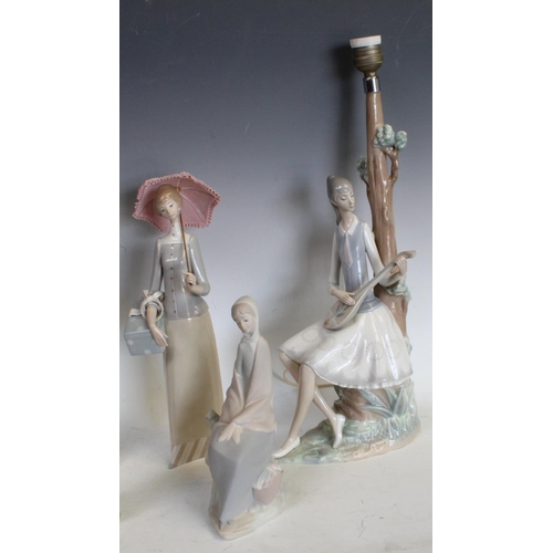 179 - A Lladro model table lamp; others similar Lladro and Nao (6)