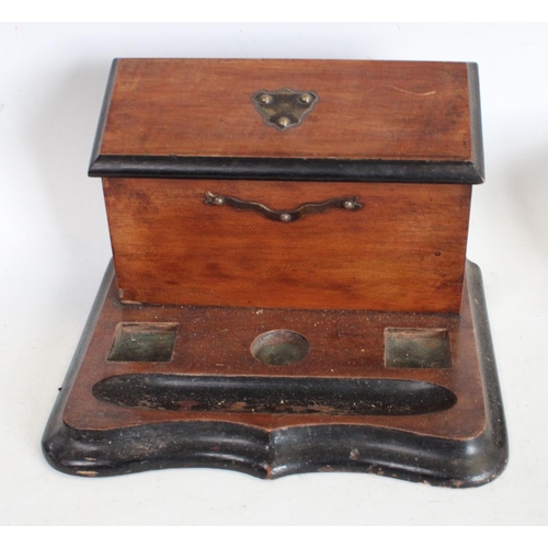 194 - A Victorian walnut and ebonised inkstand, c.1890; others: a Victorian walnut and parquetry tea caddy... 
