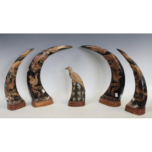 195 - A pair carved chinese horns depicting dragons, wooden mounts; another pair similar; a carved horn bi... 