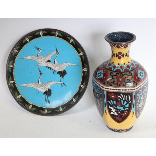 199 - A Chinese cloisonné enamel hexagonal baluster vase, decorated in polychrome with petal-shaped reserv... 