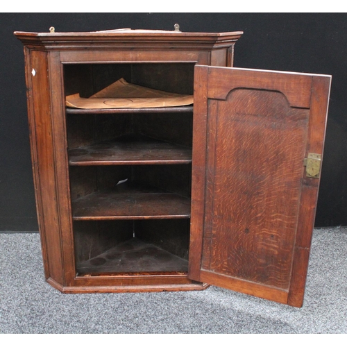 202 - A 19th century oak wall hanging corner cupboard