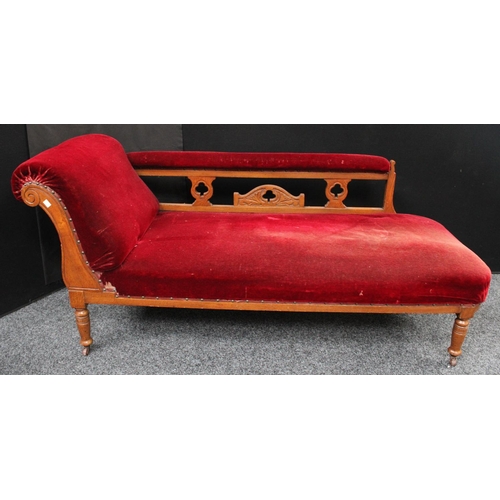 203 - An Arts and Crafts oak drawing room suite, comprising a chaise, four side chairs and a pair of armch... 