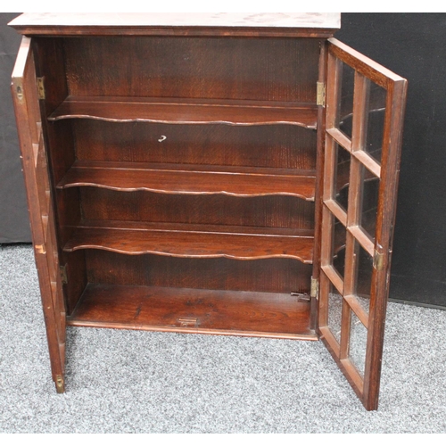 204 - A 19th century mahogany wall hanging display cabinet/china closet, moulded cornice above a pair of r... 