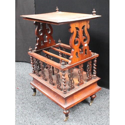 206 - A Victorian rosewood Canterbury whatnot, rectangular top with scrolling foliate end supports, the co... 