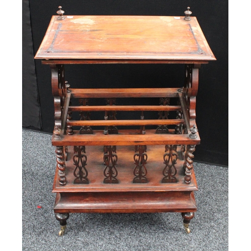 206 - A Victorian rosewood Canterbury whatnot, rectangular top with scrolling foliate end supports, the co... 