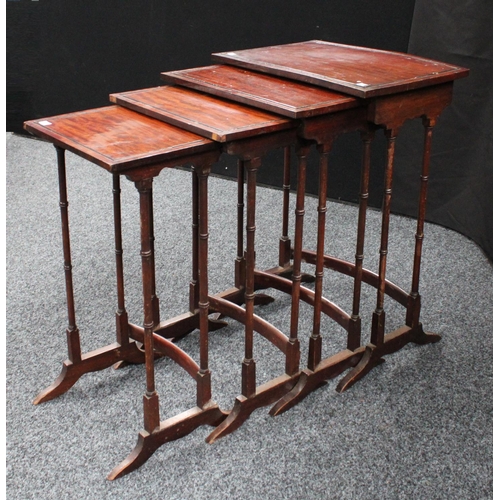 210 - A set of George III style mahogany quartetto tables, the largest 49.5cm wide